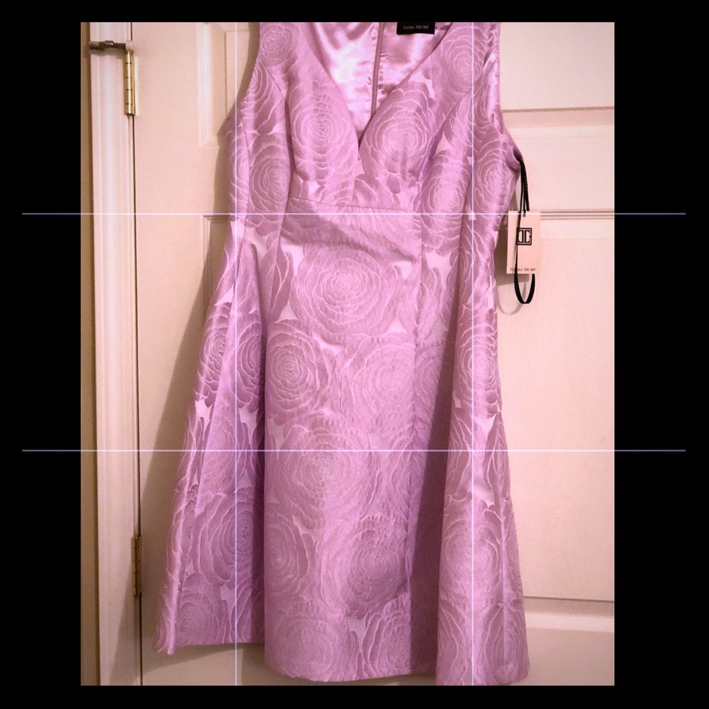 Pink brocade sleeveless brocade dress .